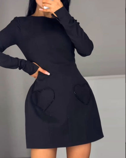 Elegancka sukienka z długim rękawem i ściągaczem w talii