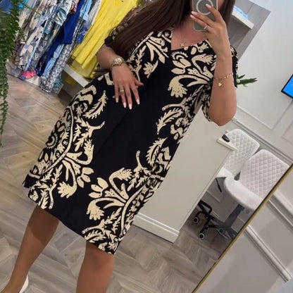 Damska sukienka z nadrukiem V-neck z kieszeniami