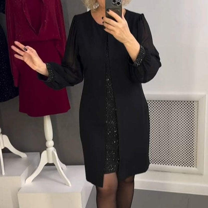 Czarna sukienka midi z ozdobnymi kamieniami szlachetnymi