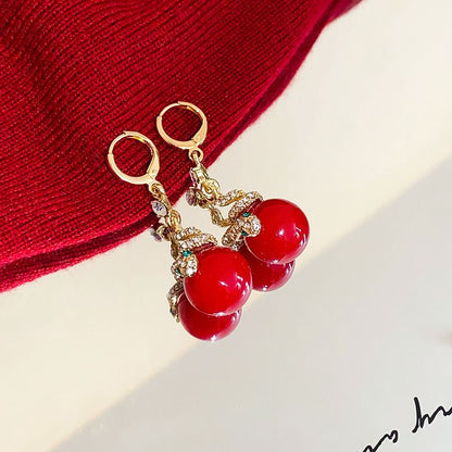 🐍Specjalna oferta noworoczna🎀 Kolczyki z pozłacanej perły w kształcie węża